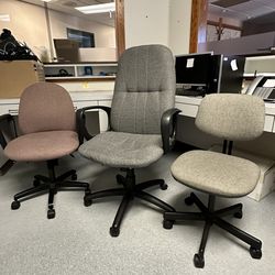 3 office chairs and 2 office/shop swivel chairs