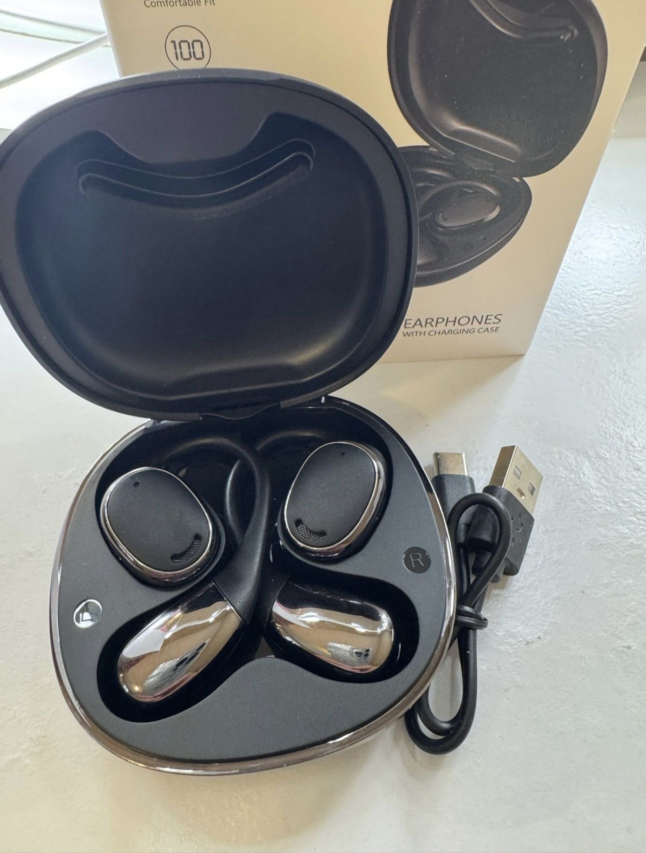 Earphones with charging case