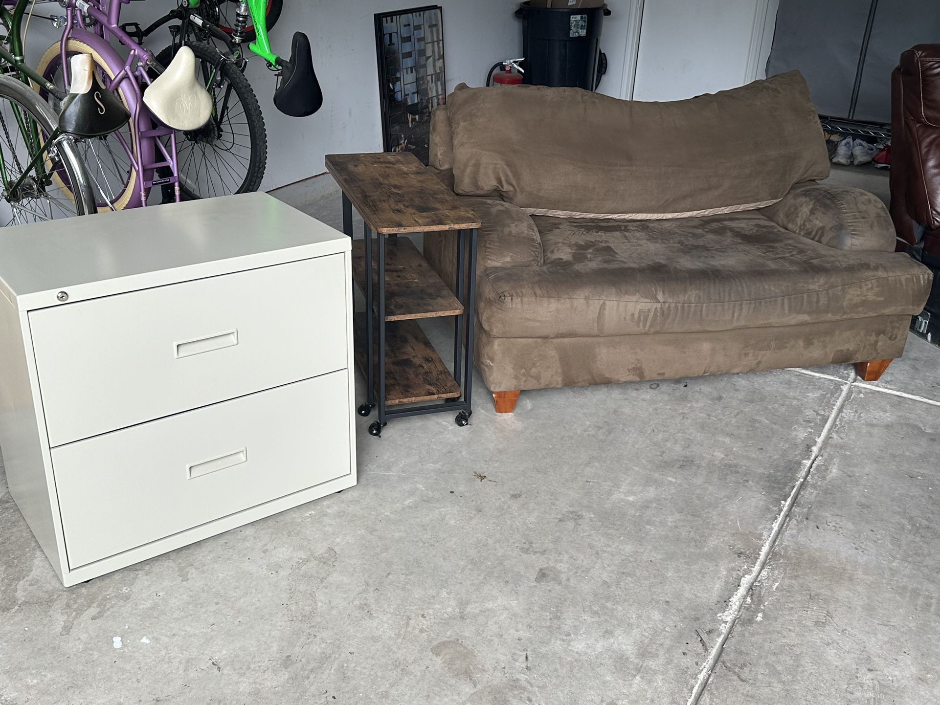 Couches, Desk, Filing Cabinet, Cork Board, End Table, 2 Shelves