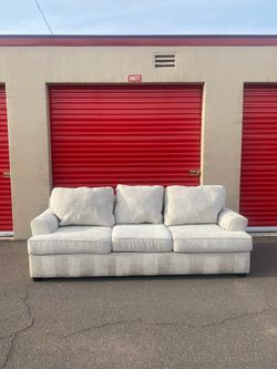 Living Spaces Gray Sectional