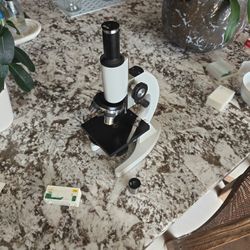 New In  A Box Celestron Microscope 