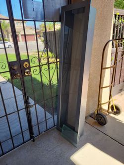 Narrow Glass Door Cabinet four glass shelves