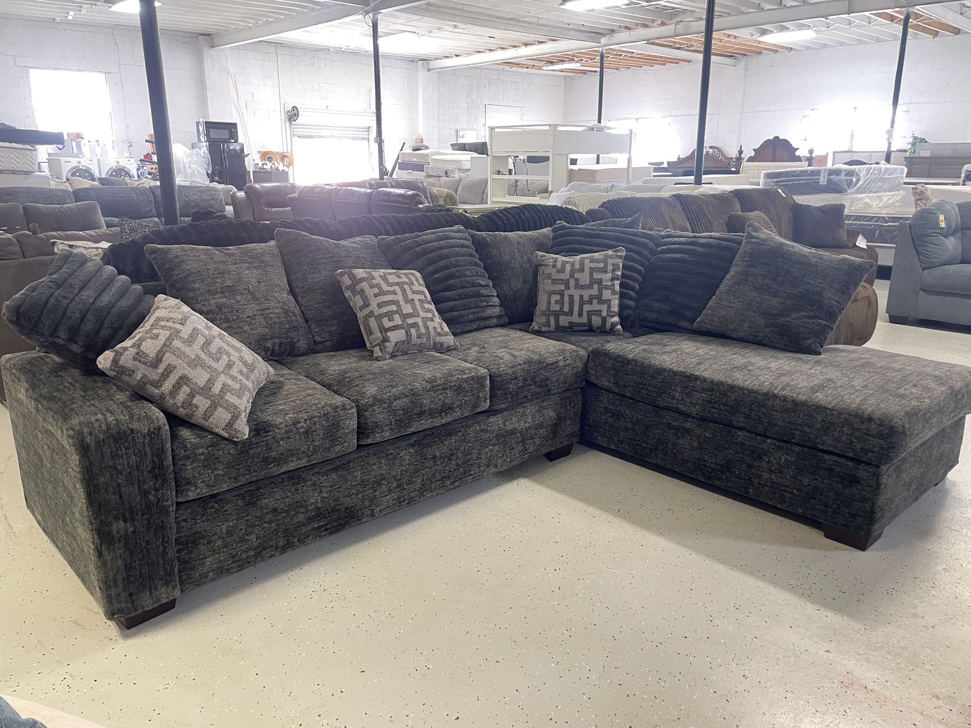 New sectional 118” by 88” $1299