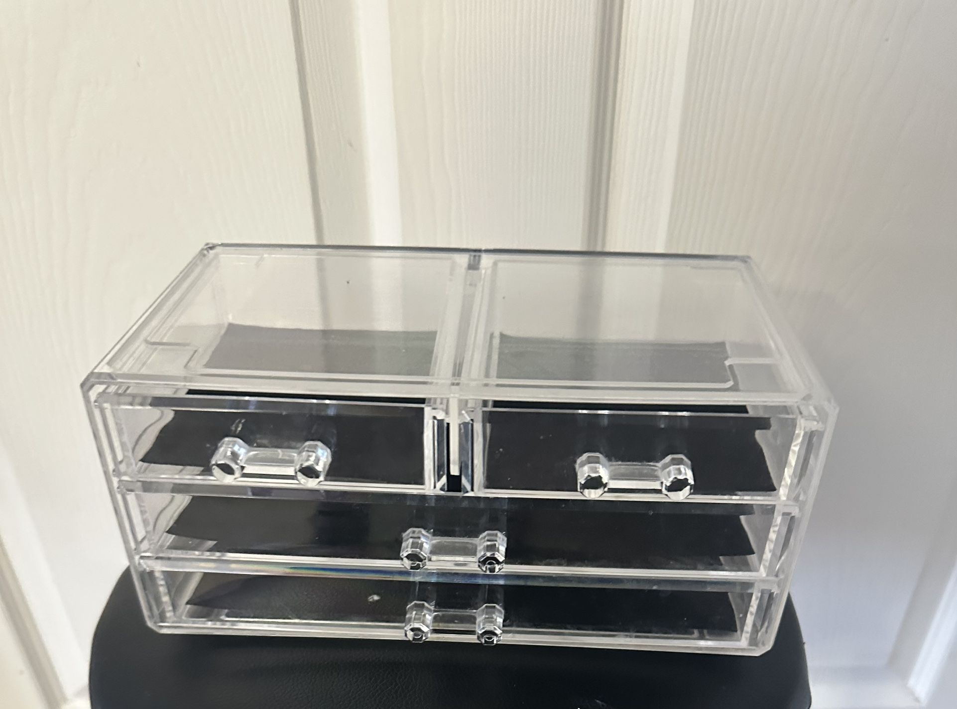 Clear jewelry organizer with three drawers