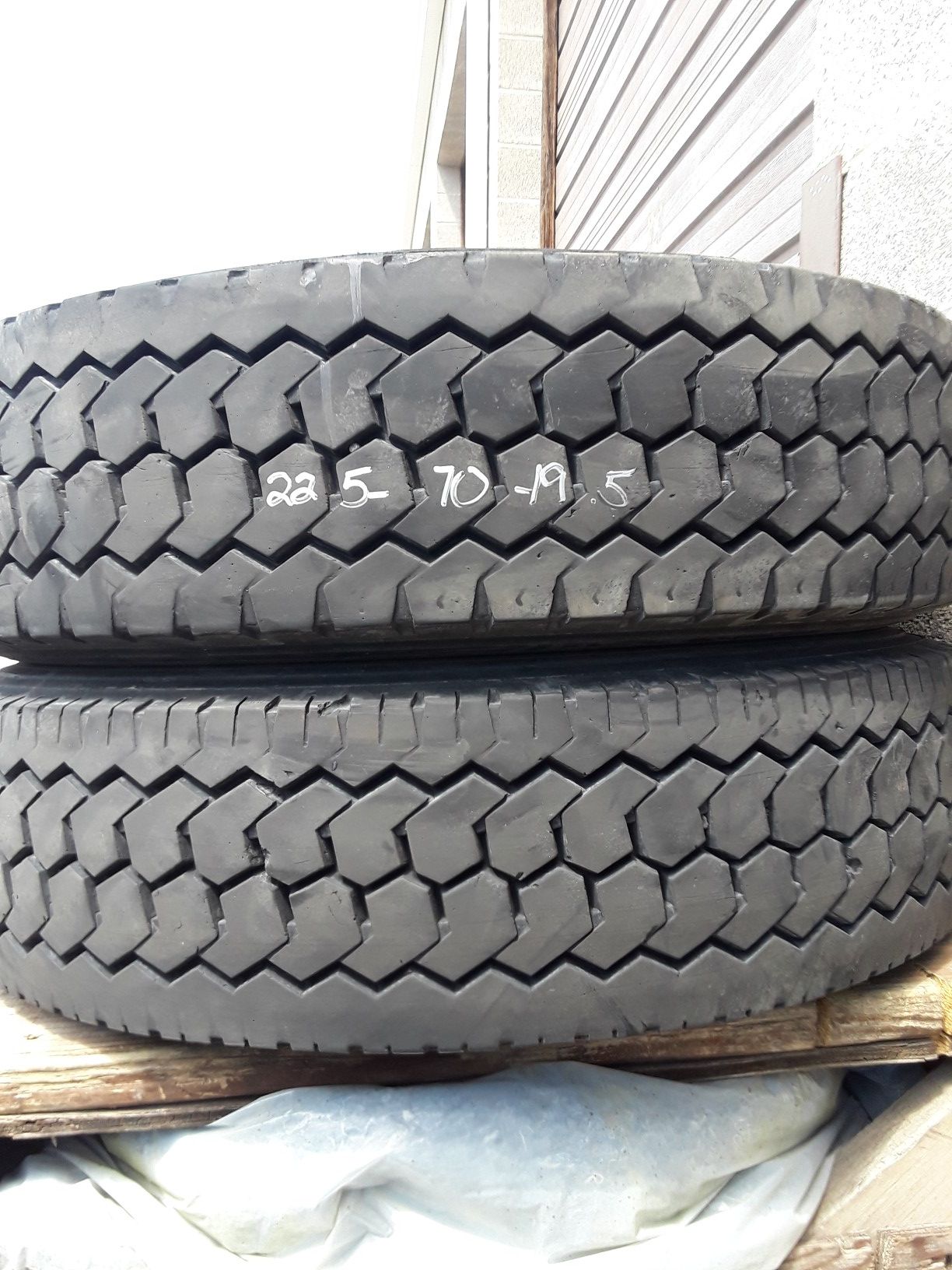 (2)* 225/70/19.5 double coin drive tires