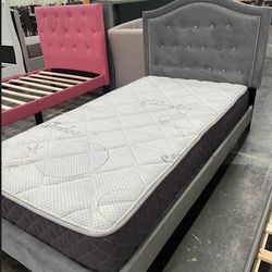 Twin size bed with mattress