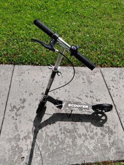 Patineta de aluminio, plegable, con freno de mano y timbre
