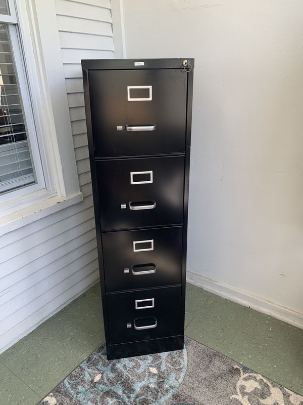 Staples 4 drawer vertical filing cabinet for Sale in Chicago, IL - OfferUp