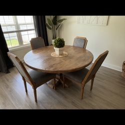 60” Table And four chairs 