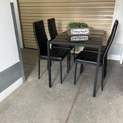 Table And 4 Chairs