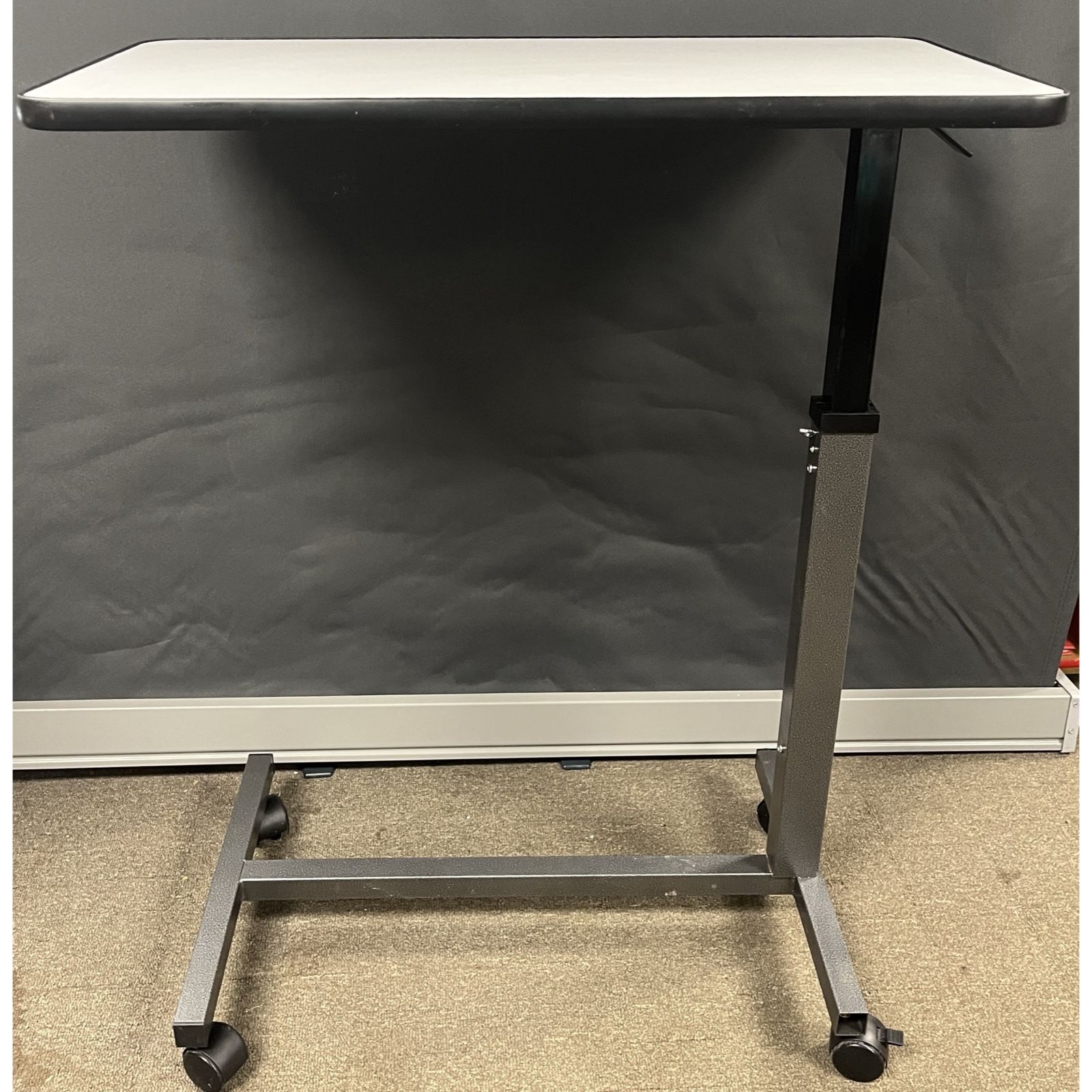Non Tilt Overbed Table on wheels, adjustable height. ProHeal PMOVBT-GRY-MP