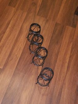 4 black candle holders