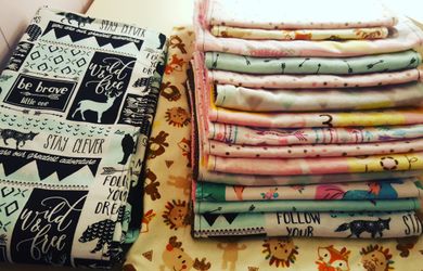 Blanket and burp cloths