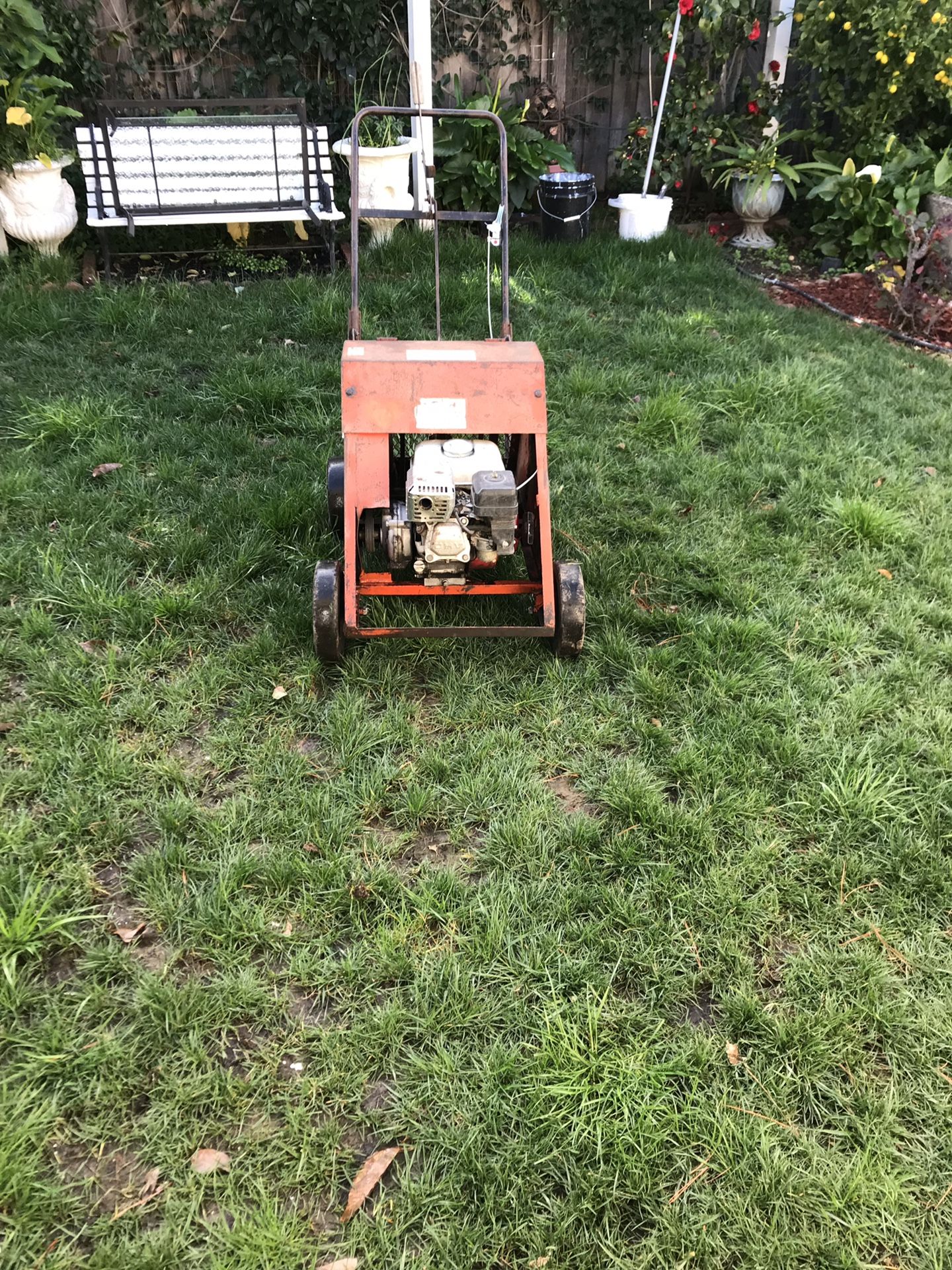 Used. Lawn Aerator. 3 prong plugger with Honda Engine $485
