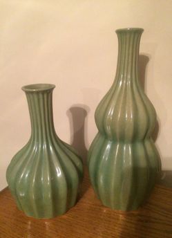 Two green vases