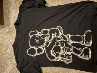 KAWS x Uniqlo Clean Slate Tee in black cotton with white graphic print