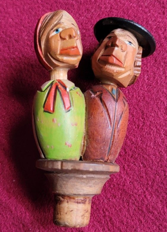 VINTAGE ANRI WOOD CARVED MECHANICAL BOTTLE STOPPER KISSING COUPLE 2 HEADED RARE