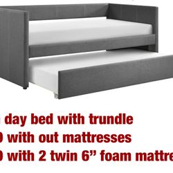 Twin day bed with trundle. 3 colors available. Assembly required. Assembly not included. Tax included. Free local delivery.  $150 with out mattresses 