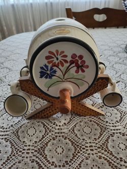 Unique German piece. Four shot glasses are the same, 2 are not. Cork goes in the top, got lost during the move