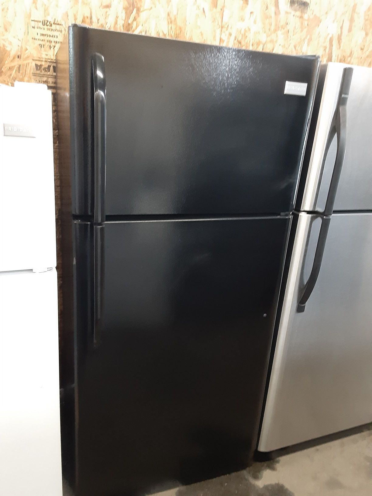 $299 Frigidaire black 18 cubic refrigerator apartment size includes delivery in the San Fernando Valley of warranty and installation