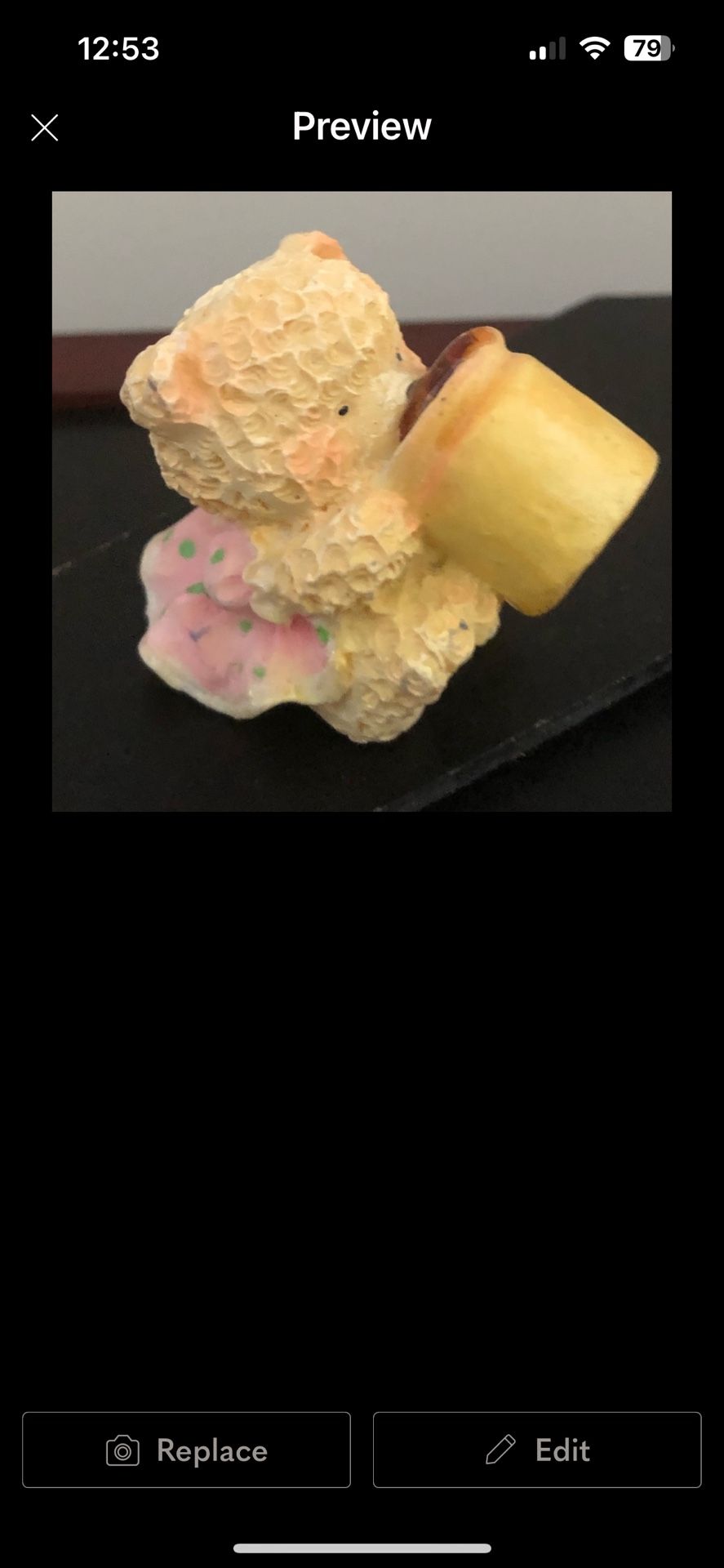 Teddy bear figurine.