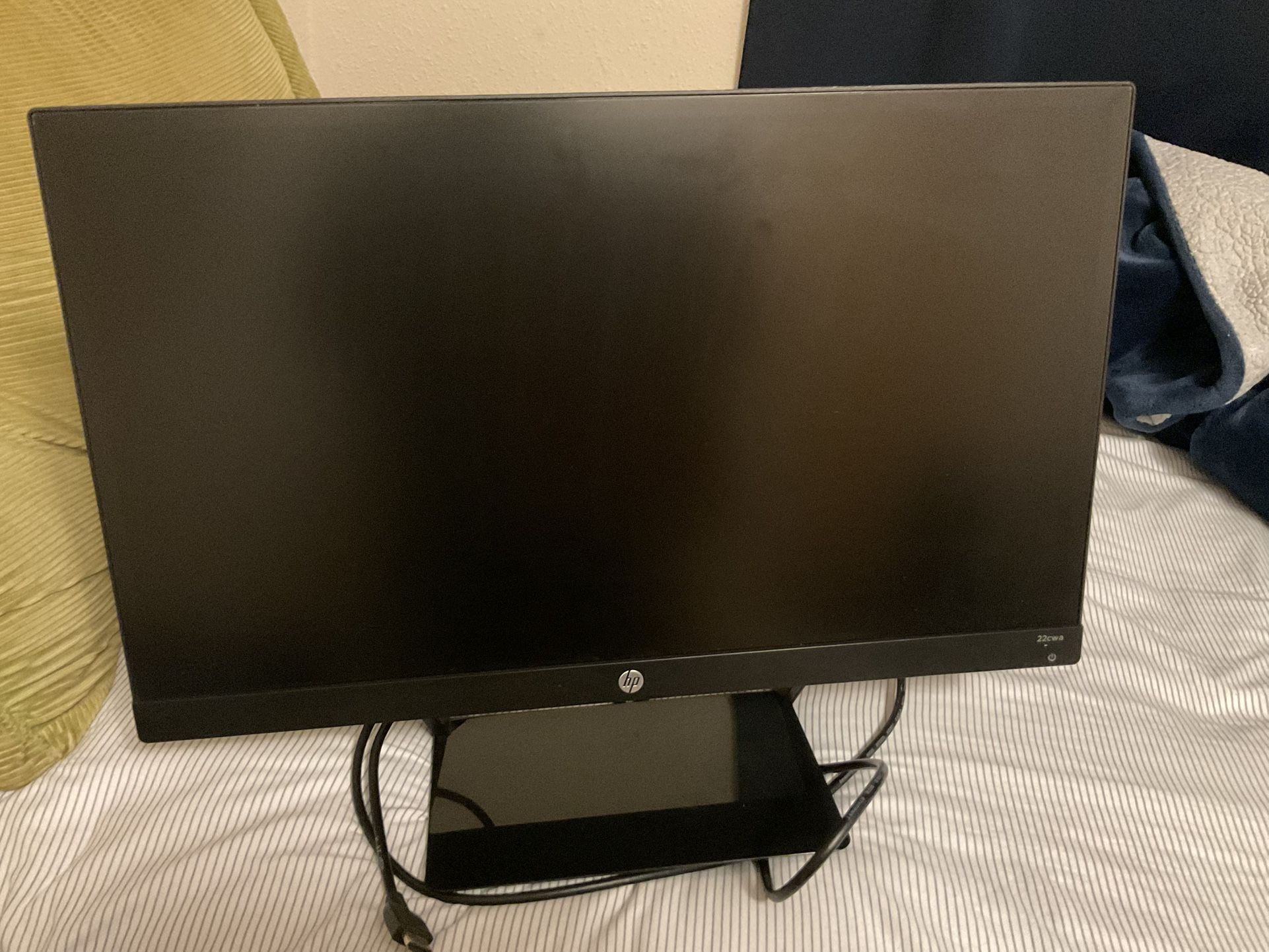 Monitor, Acoustic Guitar, And A Small Suitcase