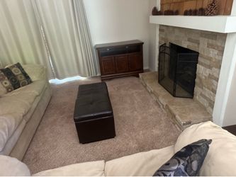 Storage ottoman/coffee table (leather, tufted)