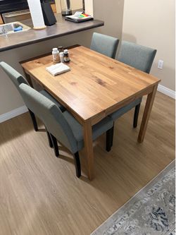 Wooden table with 8 chairs