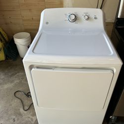 Gas Stove, Gas Dryer, And Microwave. 