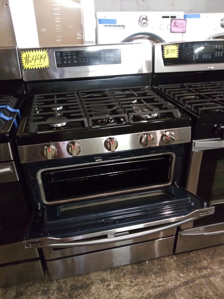 Samsung 5 burners gas stove covention oven stainless steel working perfectly for Sale in