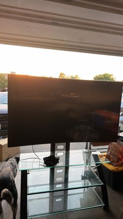 Samsung 65-inch curved tv with stand