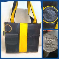 Global exchange recycled materials large zip tote bag fair trade. Excellent condition inside and out. I think it’s made of tire. Very cool yellow stri
