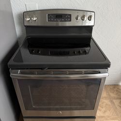 GE GLASS TOP STOVE.