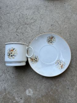 Porcelain Demitasse Cup, And Saucer