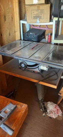 Router cabinet and craftmans table saw