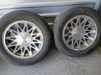 Set of Lincoln Town car rims