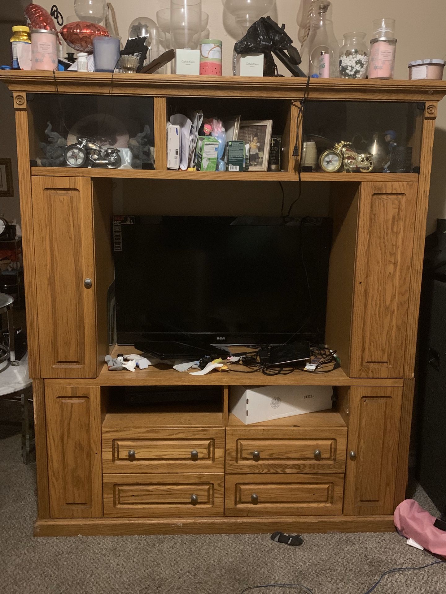 Entertainment Center and a bar free free free must pick it up by this weekend need gone Asap