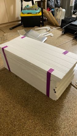 Used garage door insulation panels and reflective backing
