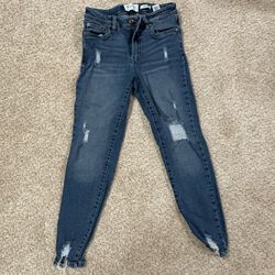 Distressed ankle jeans
