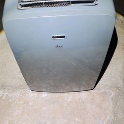 LG 12000 BTU portable air conditioner with Hose attachment  Used, works well & cold 