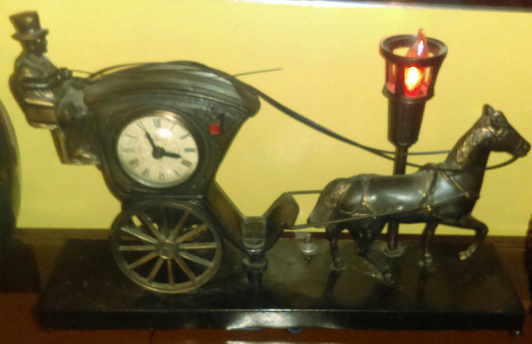 Antique horse and buggy metal clock