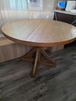 Round Pedestal Dining Table