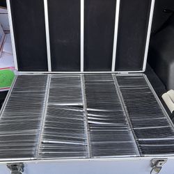 900+ DVDs with Silver case and an itemized spreadsheet. 