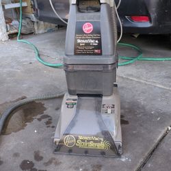 Hot Water Steam Vac Cleaner with Spin Scrub.