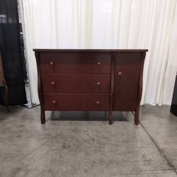 Reddish Brown Wood Dresser with Cabinet Door