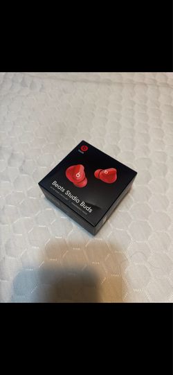 Red Beats earbuds