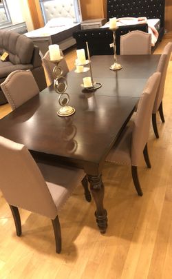 Brown solid wood expandable dining table with 6 chairs