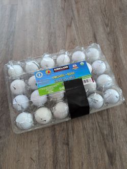 24 assorted used golf balls