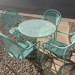 Table and four chairs