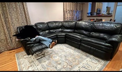 Leather couch with bed